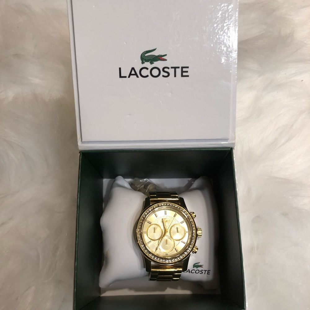 Women’s gold Lacoste watch